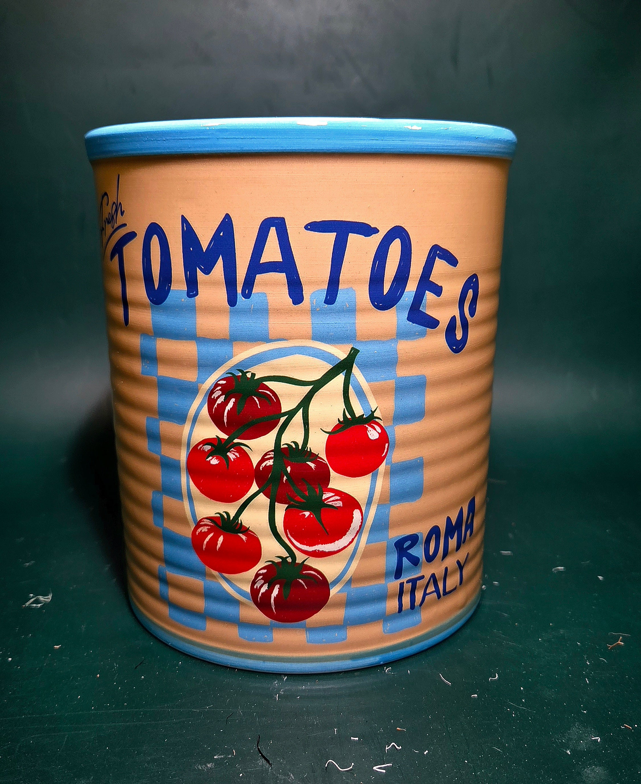 Tomatoes in a can planter