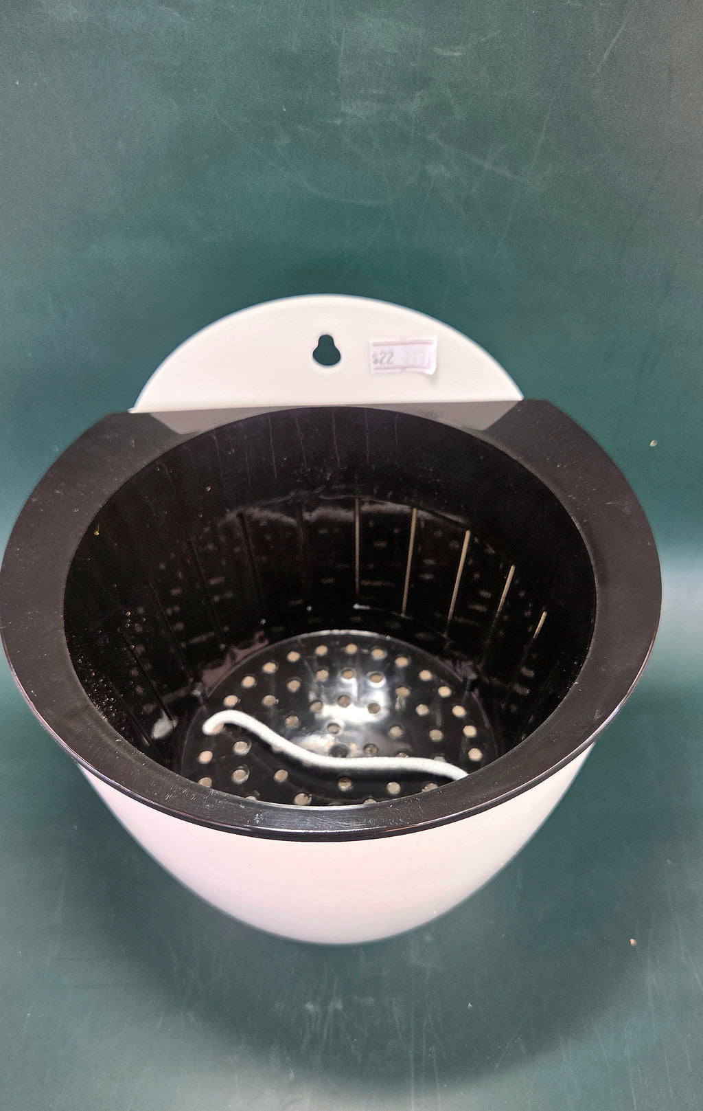 Self-watering wall planter