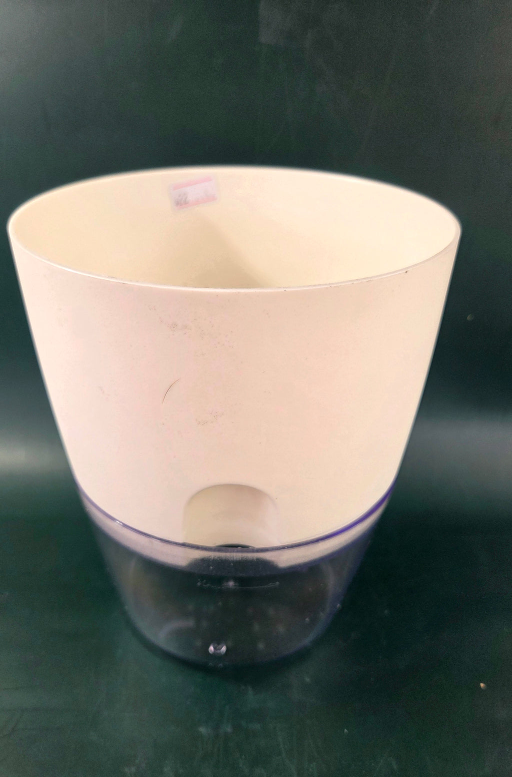 Self-watering pot