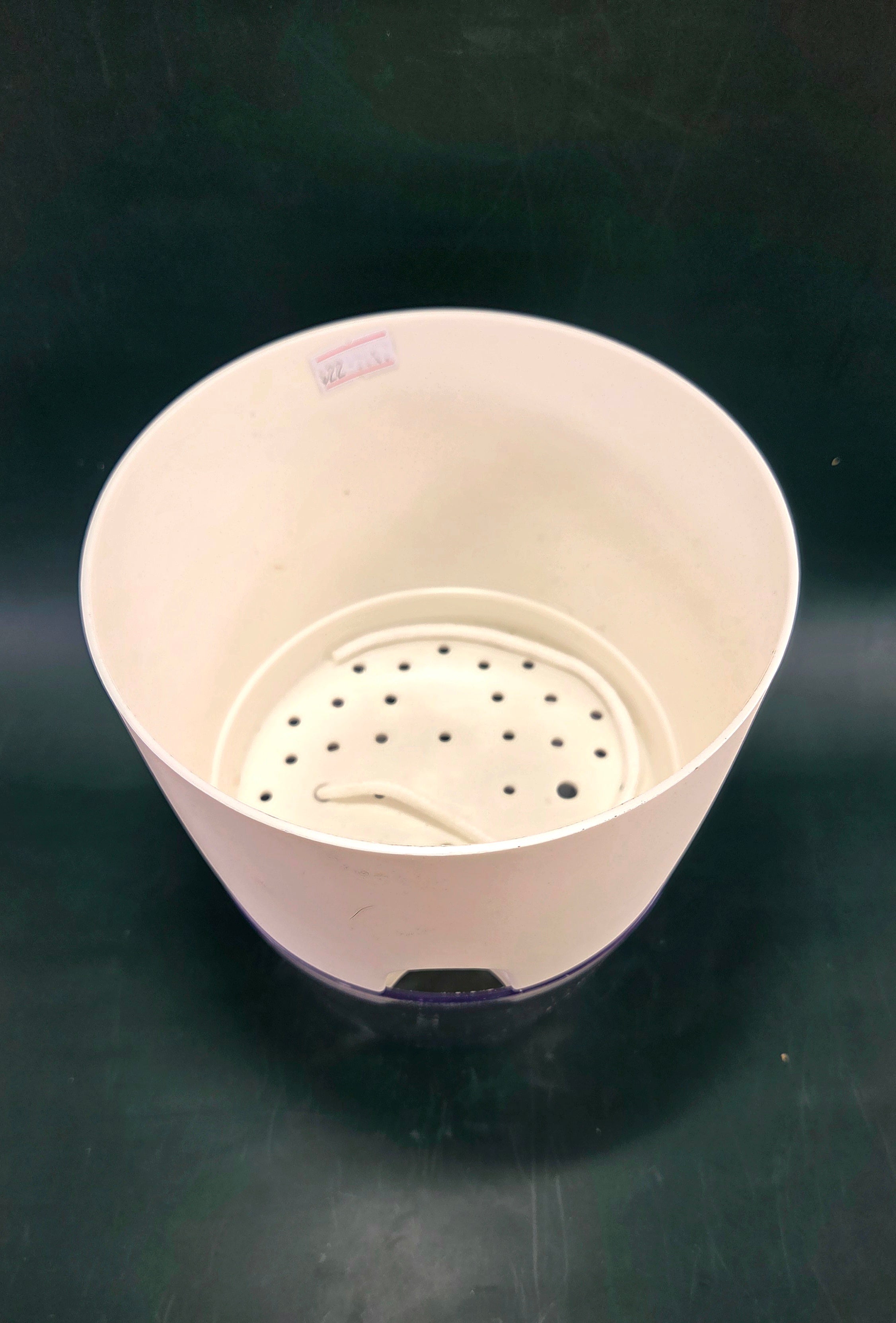 Self-watering pot
